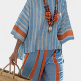 Valeria – haut strié terracotta sophistiqué et pantalons en lin